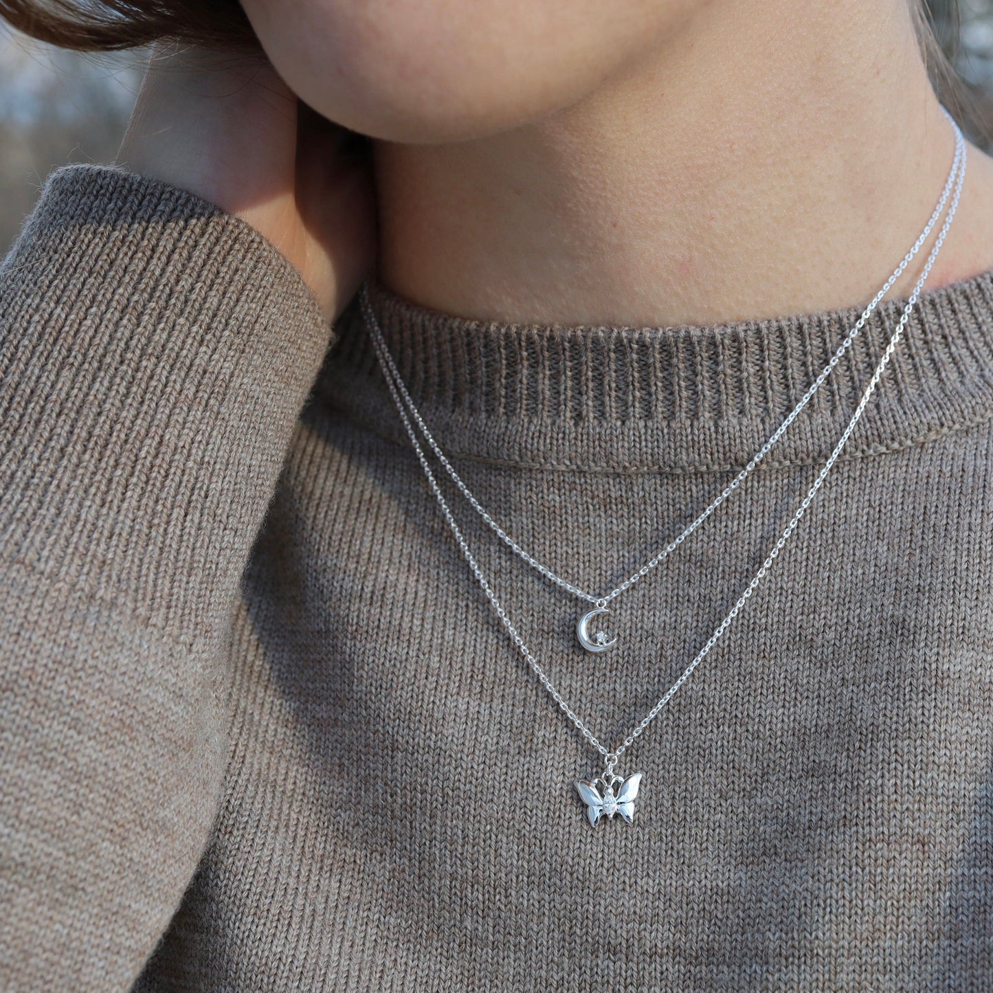 NKL Crescent Moon with Single CZ in Sterling Silver