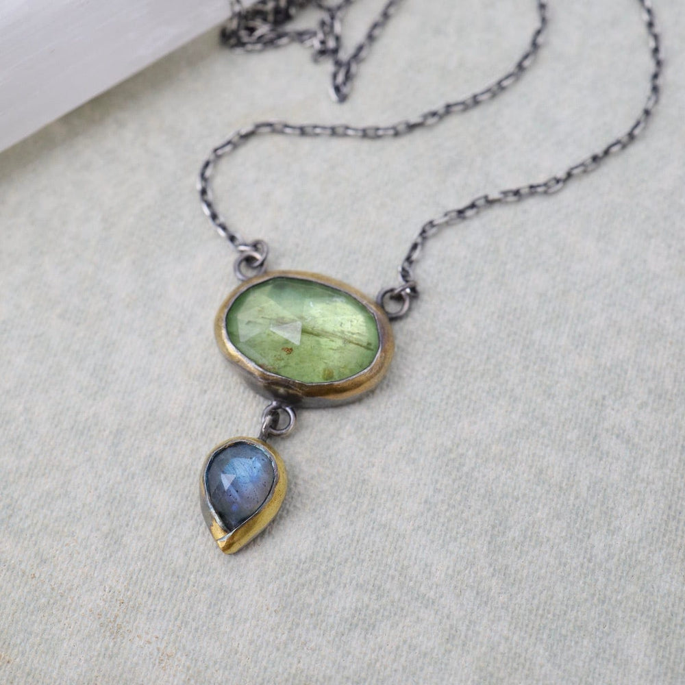 
                      
                        NKL Crescent Rim Drop Necklace in Green Kyanite & Labr
                      
                    