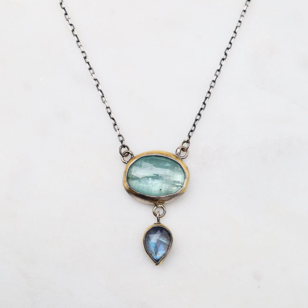 
                      
                        NKL Crescent Rim Drop Necklace in Sky Blue Kyanite wit
                      
                    