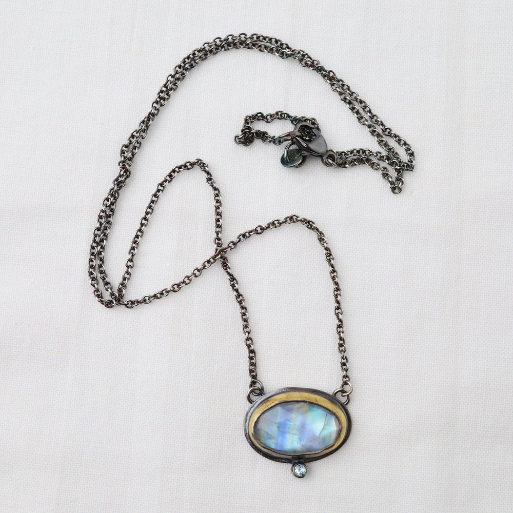 
                      
                        NKL Crescent Rim Necklace with Moonstone
                      
                    