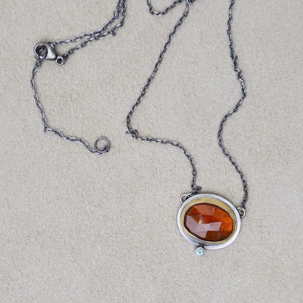 
                  
                    NKL Crescent Rim Necklace with Orange Kyanite
                  
                