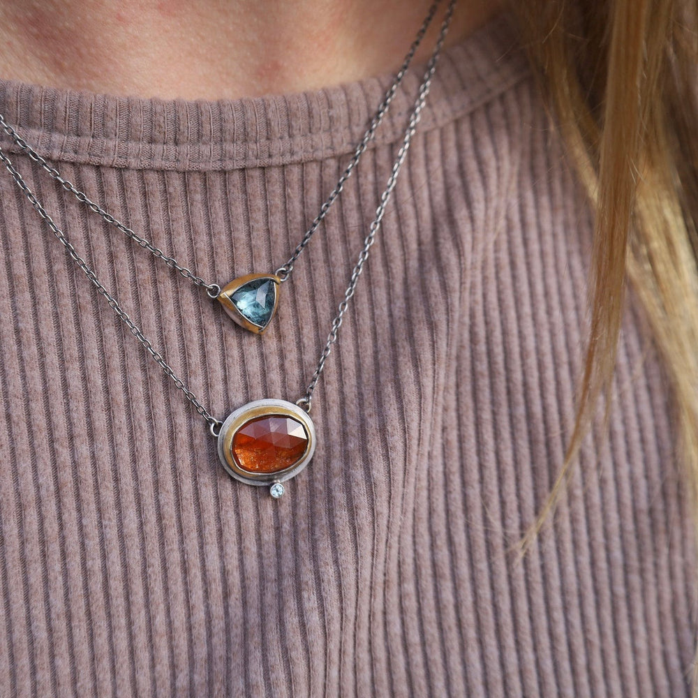 
                  
                    NKL Crescent Rim Necklace with Orange Kyanite
                  
                