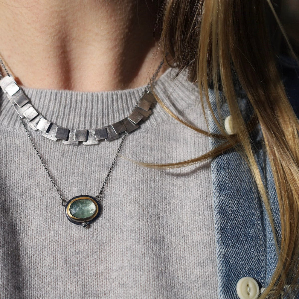 
                      
                        NKL Crescent Rim Necklace with Sky Blue Kyanite
                      
                    