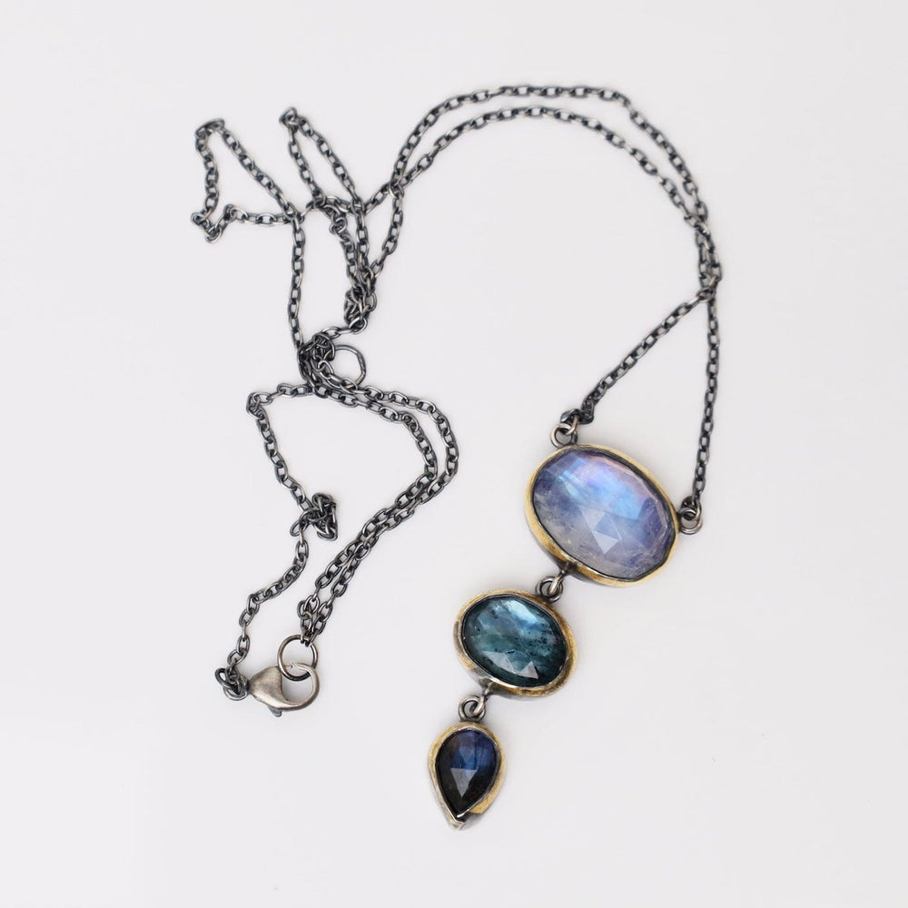 
                  
                    NKL Crescent Rim Triple Drop Necklace with Moonstone,
                  
                