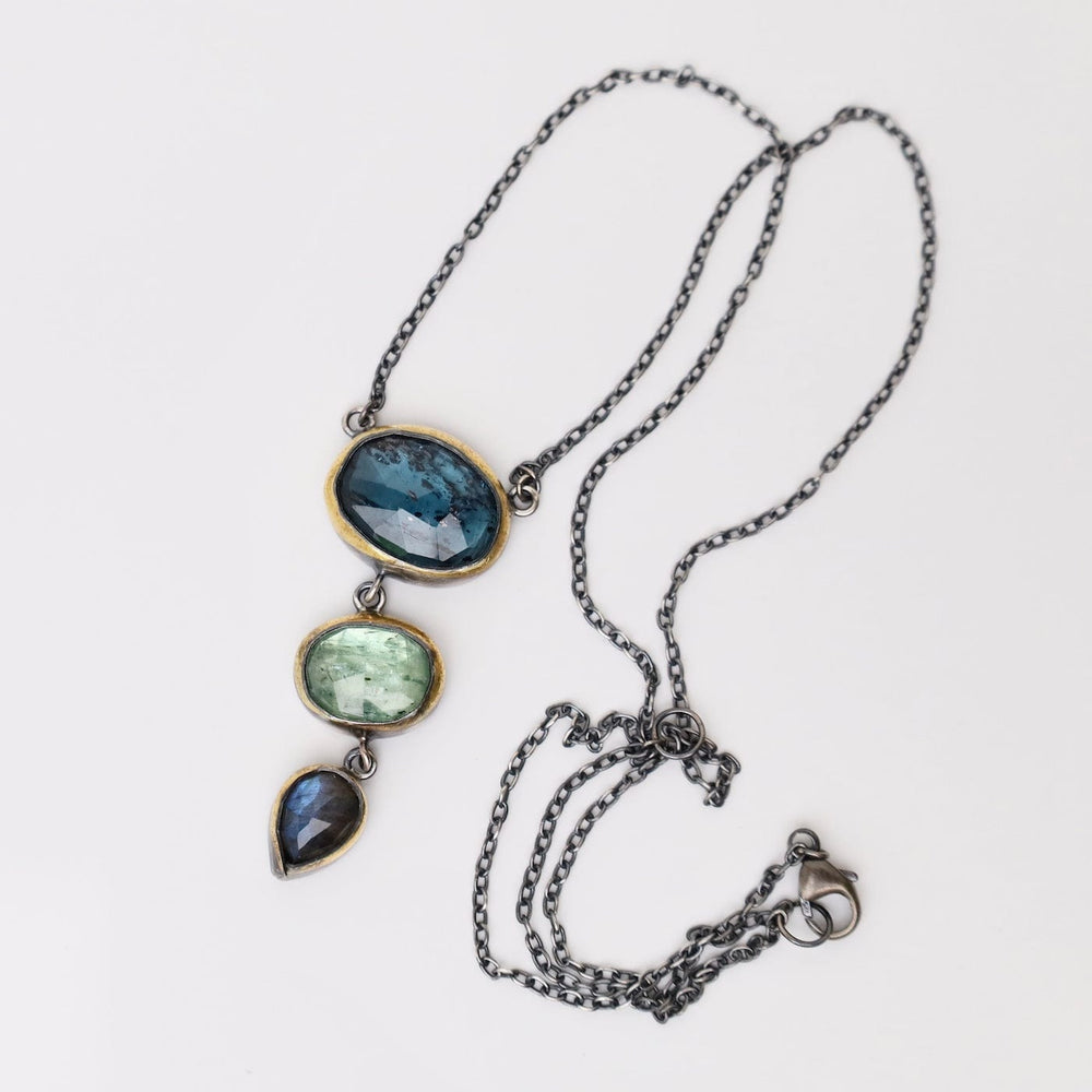 
                  
                    NKL Crescent Rim Triple Drop Necklace with Teal Kyanit
                  
                