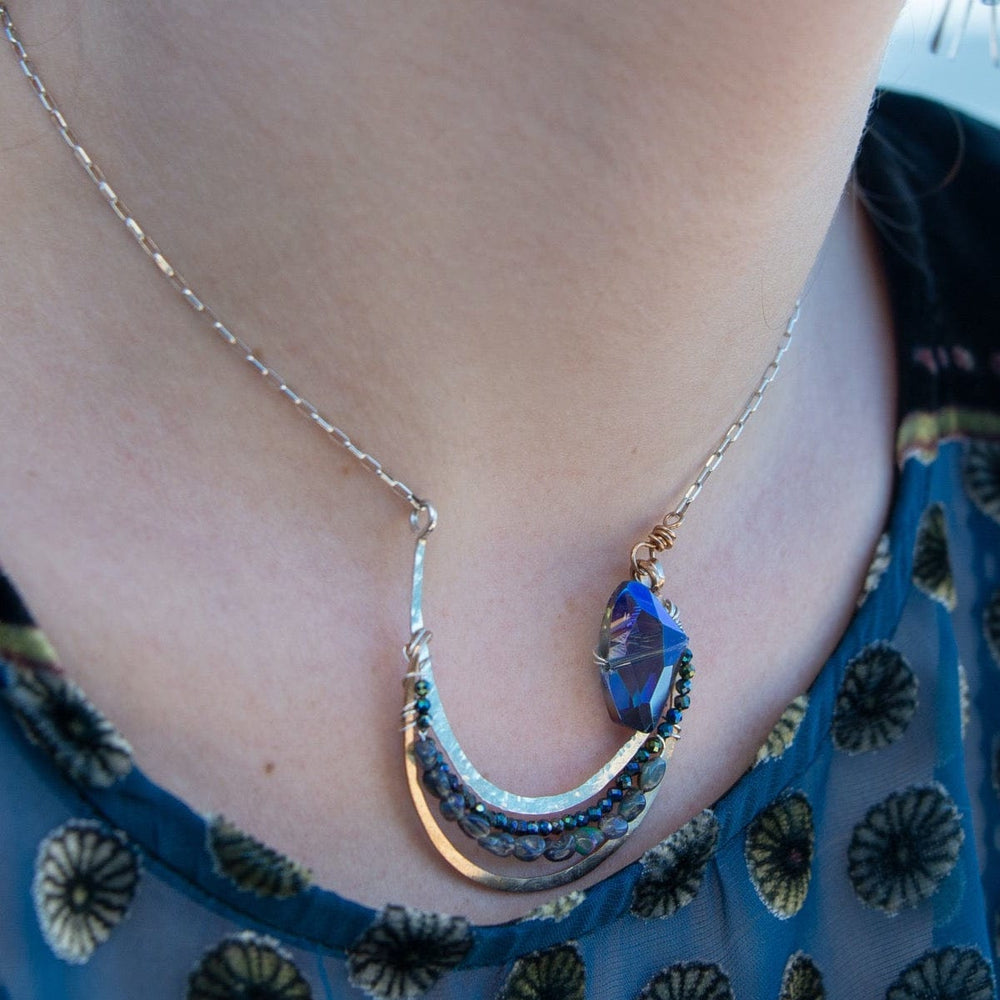 
                      
                        NKL Curvature Necklace
                      
                    