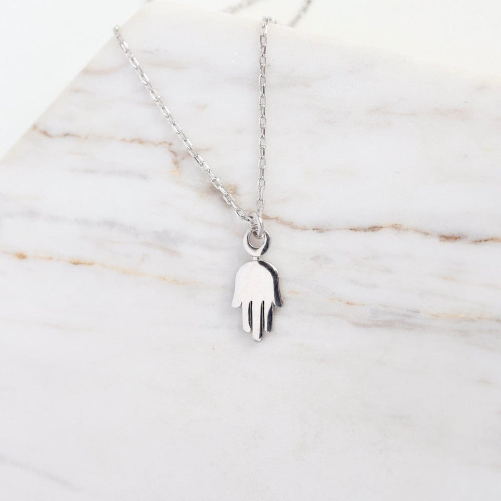 
                  
                    NKL Dainty and Sleek Silver Hamsa Necklace
                  
                