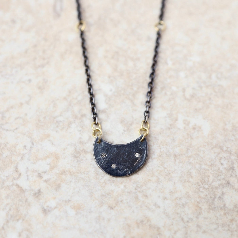 
                  
                    NKL Dark Moon Necklace
                  
                