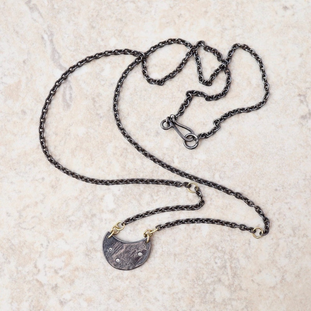 
                  
                    NKL Dark Moon Necklace
                  
                