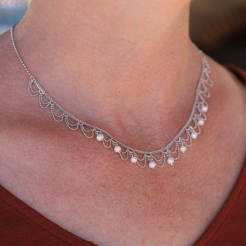 
                      
                        NKL Delicate Draped Lace with Nine Dancing Pearls Necklace
                      
                    