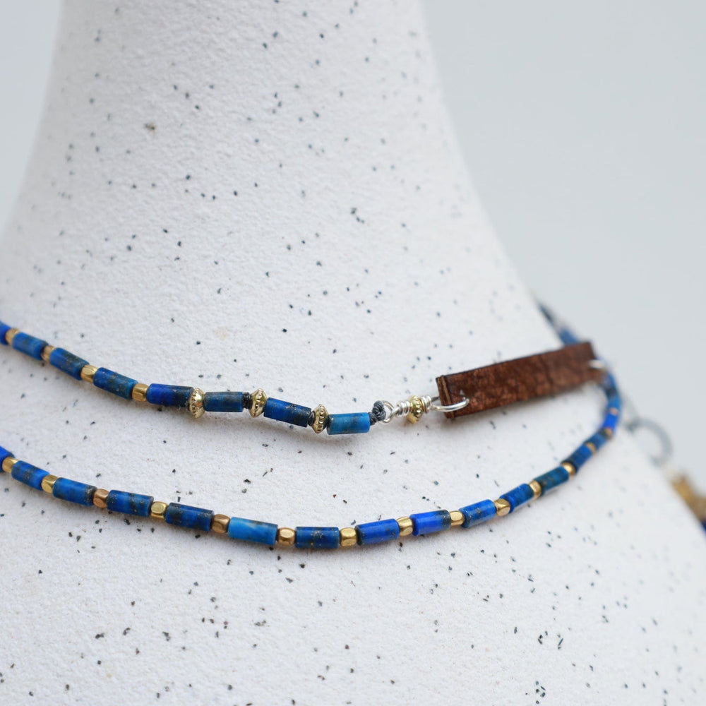 
                  
                    NKL Delicate Lapis & Leather Necklace
                  
                