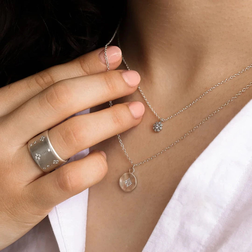
                  
                    NKL-DIA Four Star Wave Charm Pendant with Diamonds
                  
                
