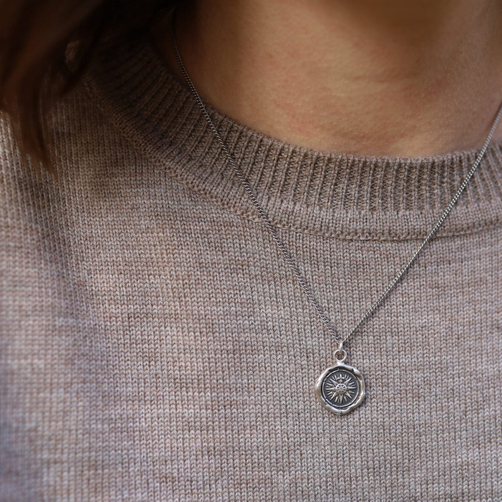 
                      
                        NKL Direction Talisman Necklace
                      
                    