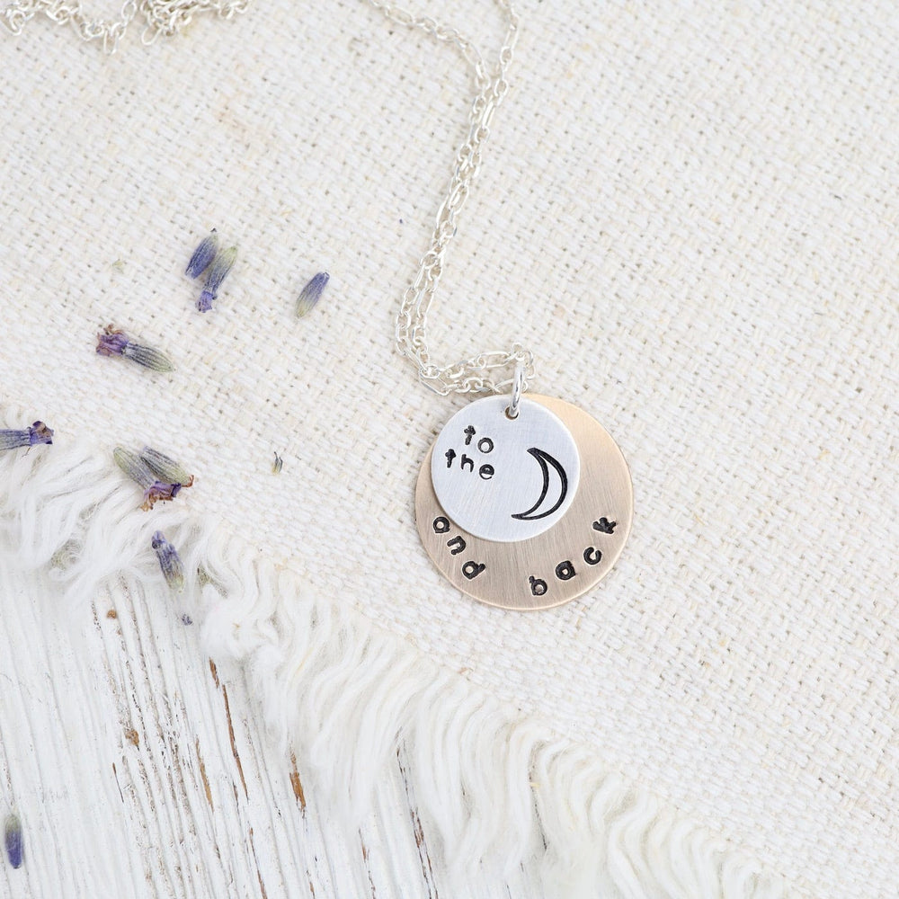 
                      
                        NKL Double Disc "To the Moon, and Back" Necklace
                      
                    