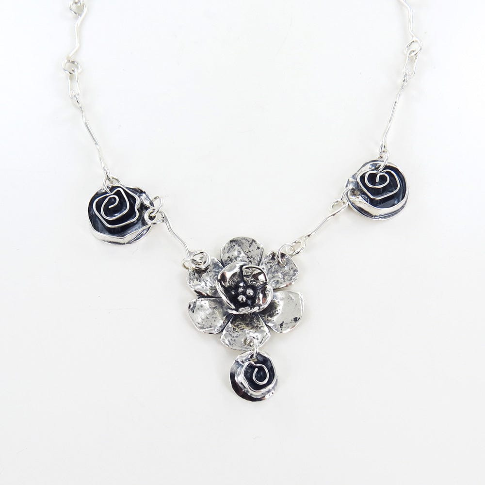 
                      
                        NKL DOUBLE DOGWOOD AND ROSE NECKLACE
                      
                    