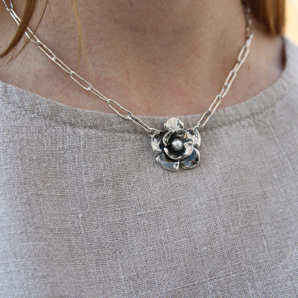 
                      
                        NKL Double Dogwood Necklace with Pearl on Oval Link Chain
                      
                    