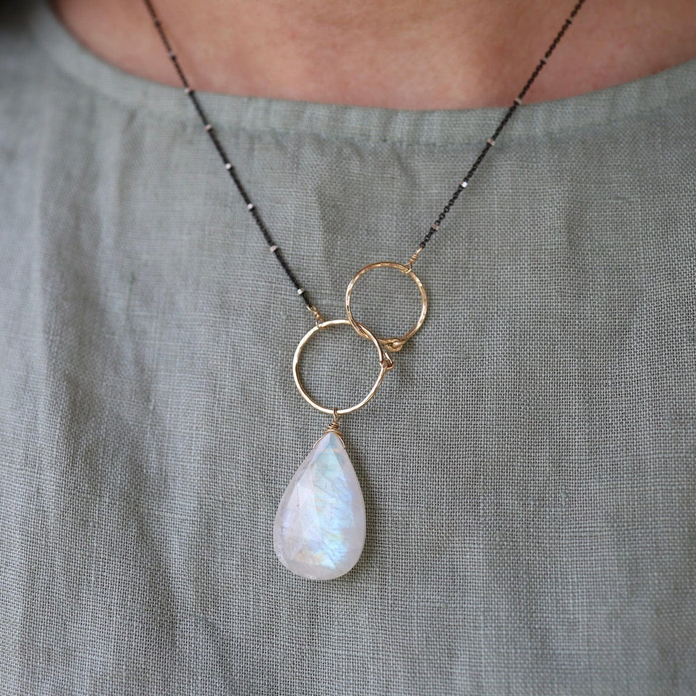 
                      
                        NKL Double Gold Filled Rings with Large Rainbow Moonstone Necklace
                      
                    