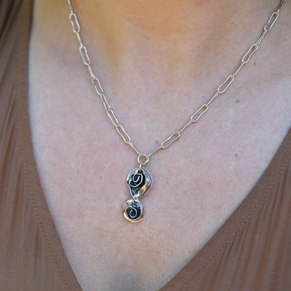 
                      
                        NKL Double Rose Drop Necklace
                      
                    