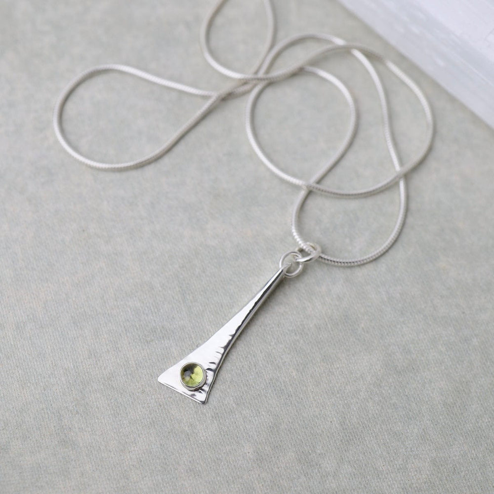 
                      
                        NKL Elongated Pendant Necklace with Peridot
                      
                    