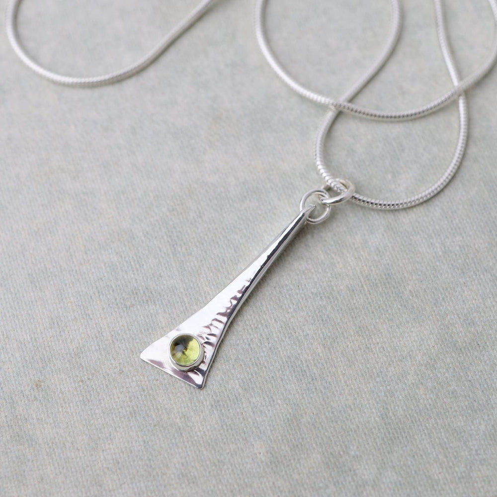 
                      
                        NKL Elongated Pendant Necklace with Peridot
                      
                    