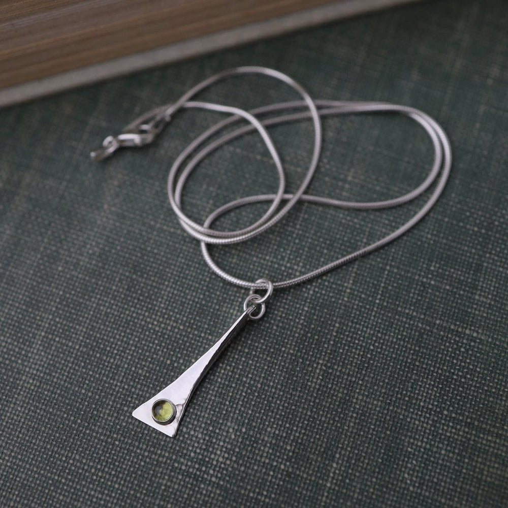 
                      
                        NKL Elongated Pendant Necklace with Peridot
                      
                    