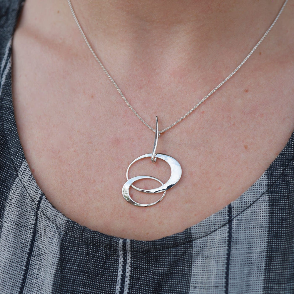 
                      
                        NKL Entwined Elegance Pendant
                      
                    