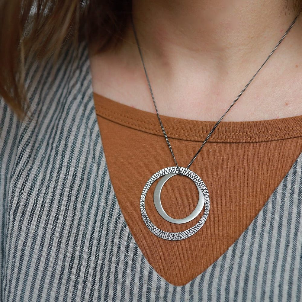 
                      
                        NKL Etched & Plain Silver Circles Necklace
                      
                    