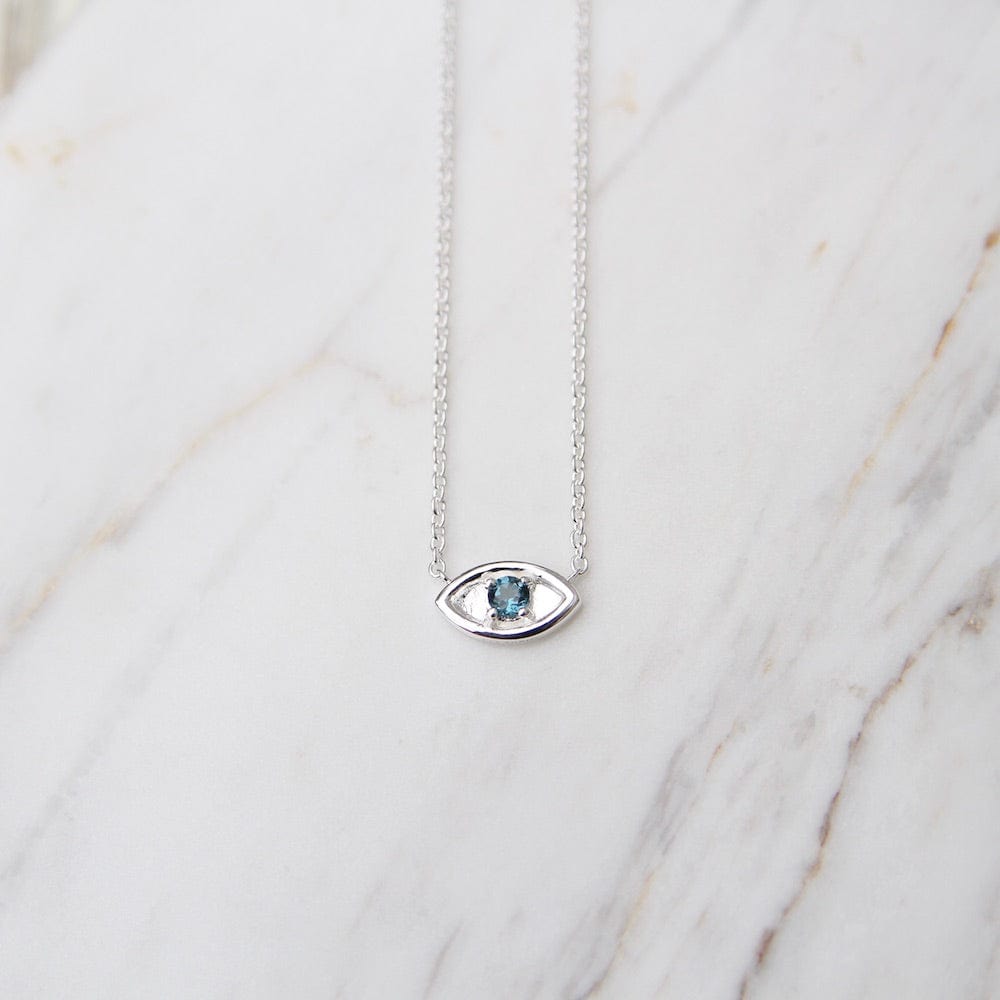 
                      
                        NKL Evil Eye with London Blue Topaz - Sterling Silver
                      
                    