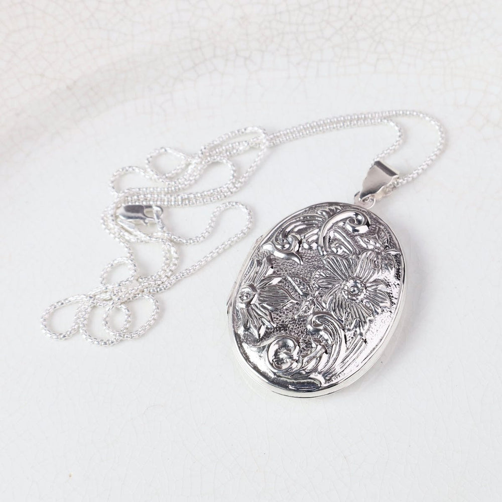 
                  
                    NKL Extra Large Raised Floral Detail Oval Locket Necklace
                  
                