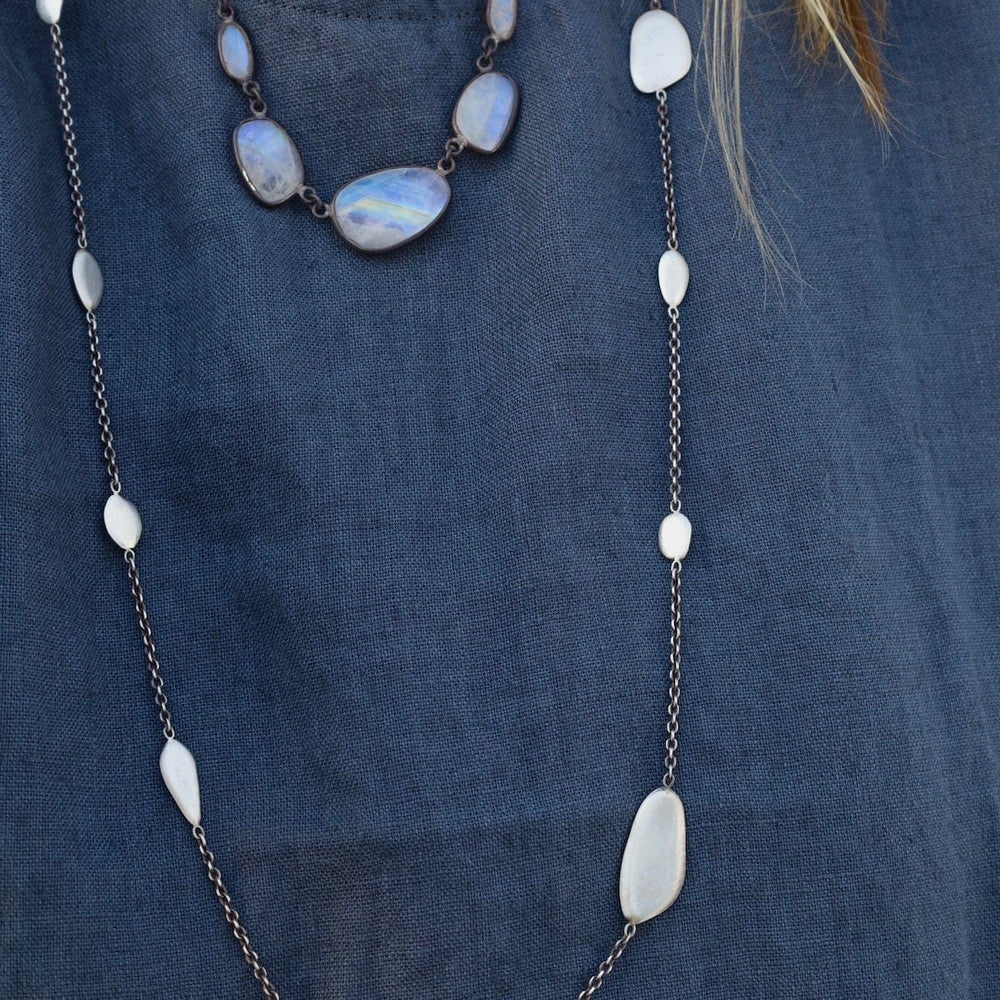 
                      
                        NKL Faceted Rainbow Moonstone Drop Necklace
                      
                    