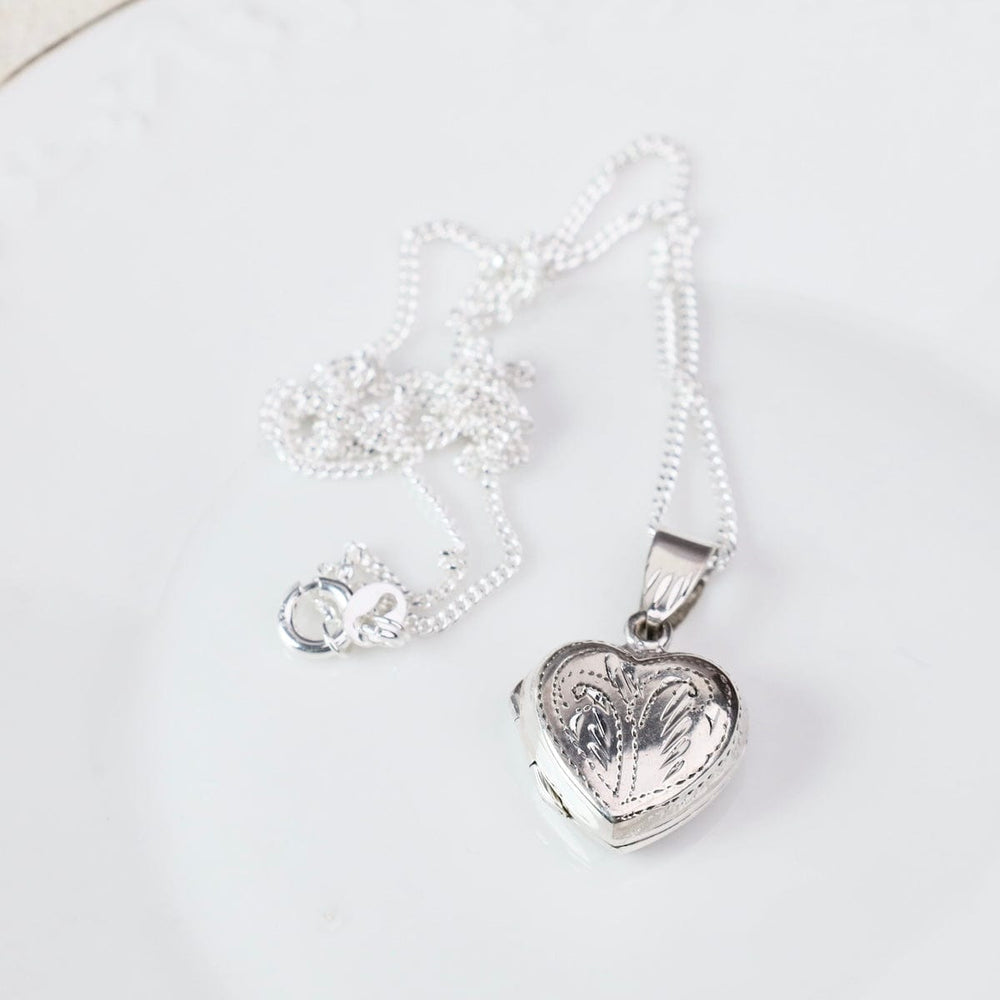 
                  
                    NKL Fern Etched Heart Locket Necklace
                  
                