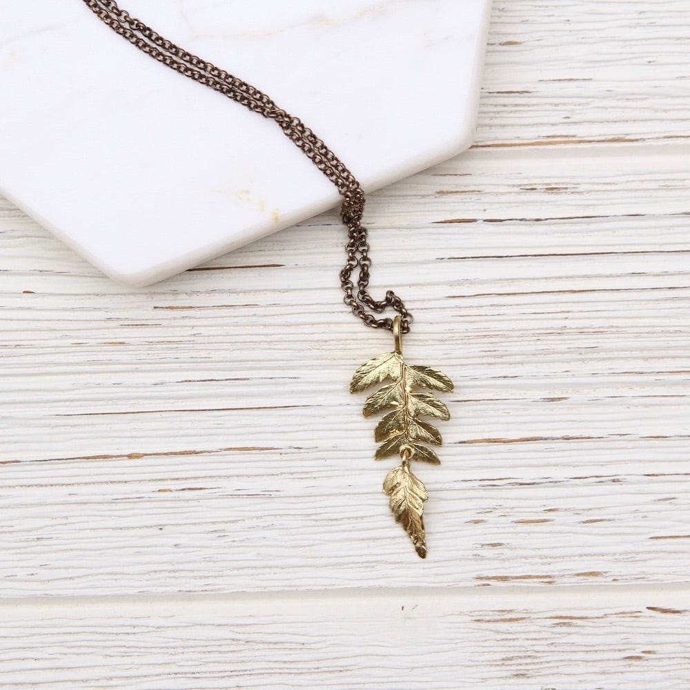 
                      
                        NKL Fern Small Pendant Necklace
                      
                    