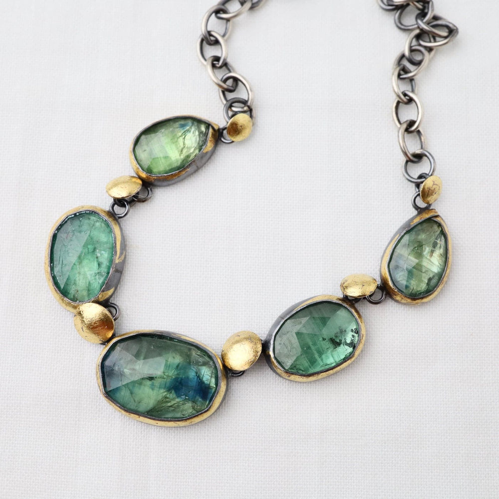 
                      
                        NKL Five Crescent Rim Necklace with Green Kyanite
                      
                    