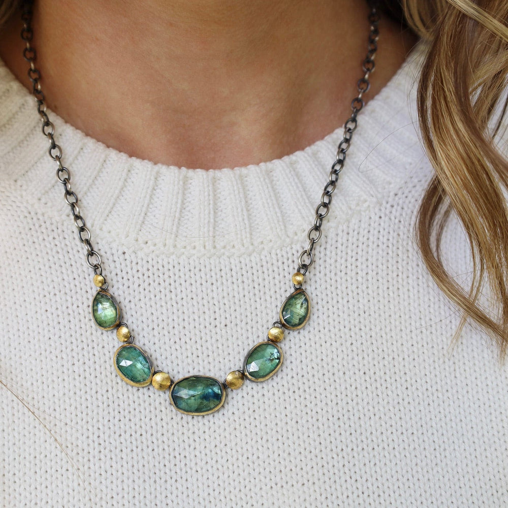 
                      
                        NKL Five Crescent Rim Necklace with Green Kyanite
                      
                    