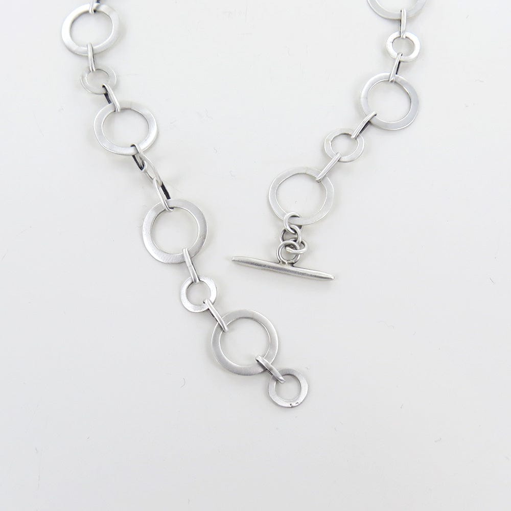 
                      
                        NKL Flat Circle Link Necklace - Sterling Silver
                      
                    