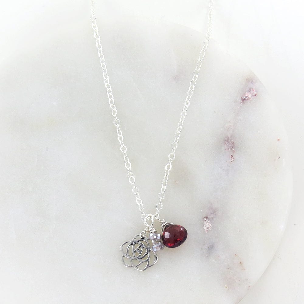 NKL FLOWER AND GARNET NECKLACE