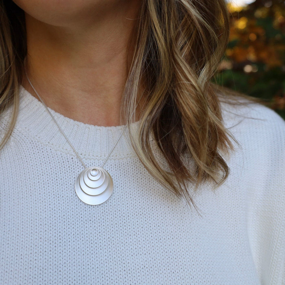 
                      
                        NKL Forever Circles Pendant
                      
                    