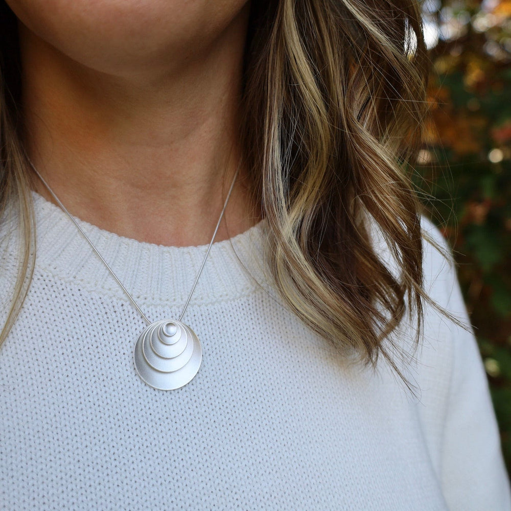 
                      
                        NKL Forever Circles Pendant
                      
                    