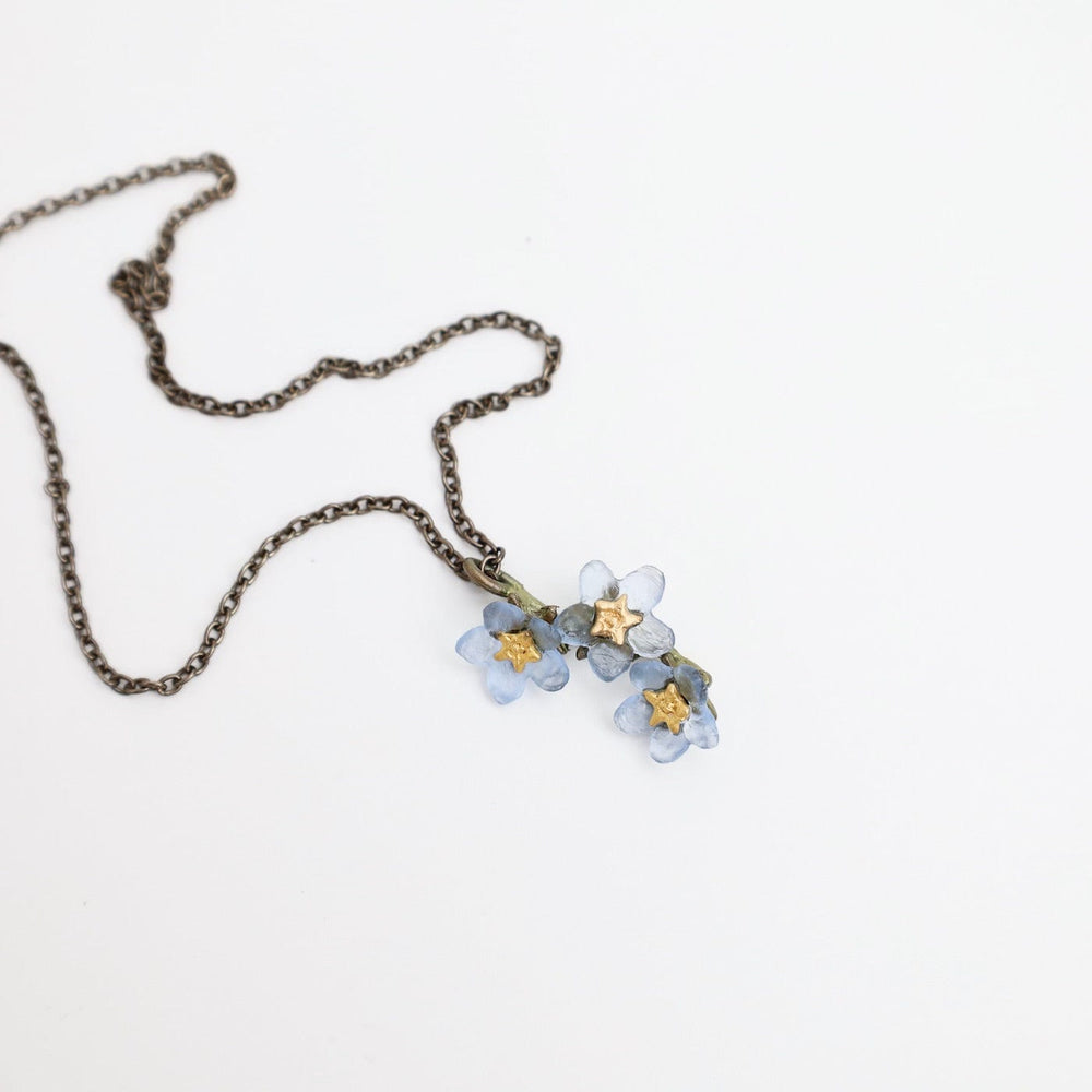 
                      
                        NKL Forget Me Not Flower Pendant
                      
                    