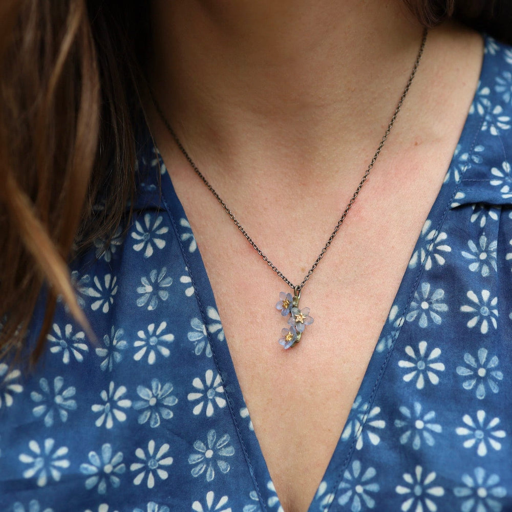 
                      
                        NKL Forget Me Not Flower Pendant
                      
                    