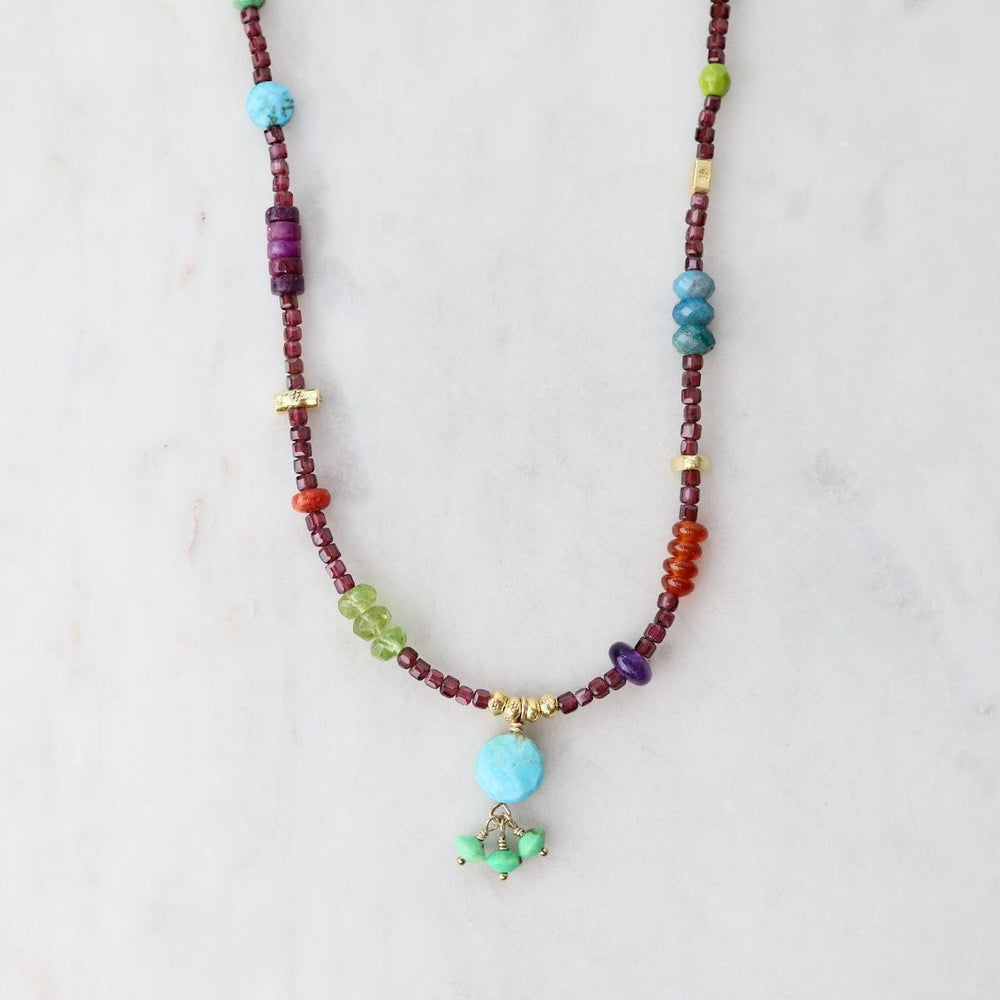 
                      
                        NKL Garnet Cube with Turquoise Drop Necklace
                      
                    