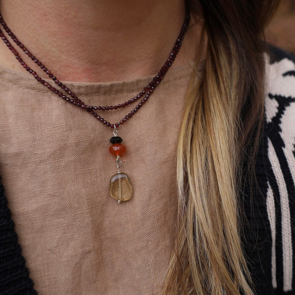 
                  
                    NKL Garnet with Lemon Quartz Drop Necklace
                  
                