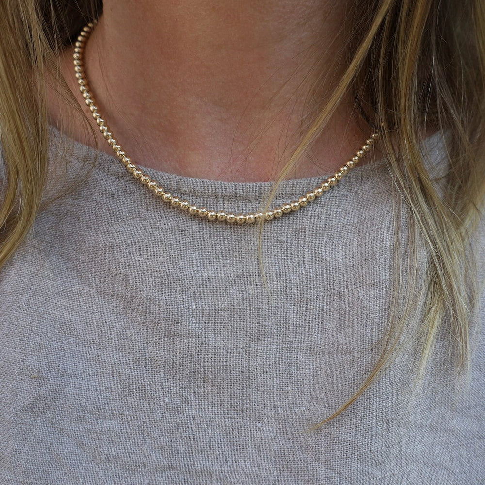 
                      
                        NKL-GF 4mm Gold Filled Bead Choker Necklace
                      
                    