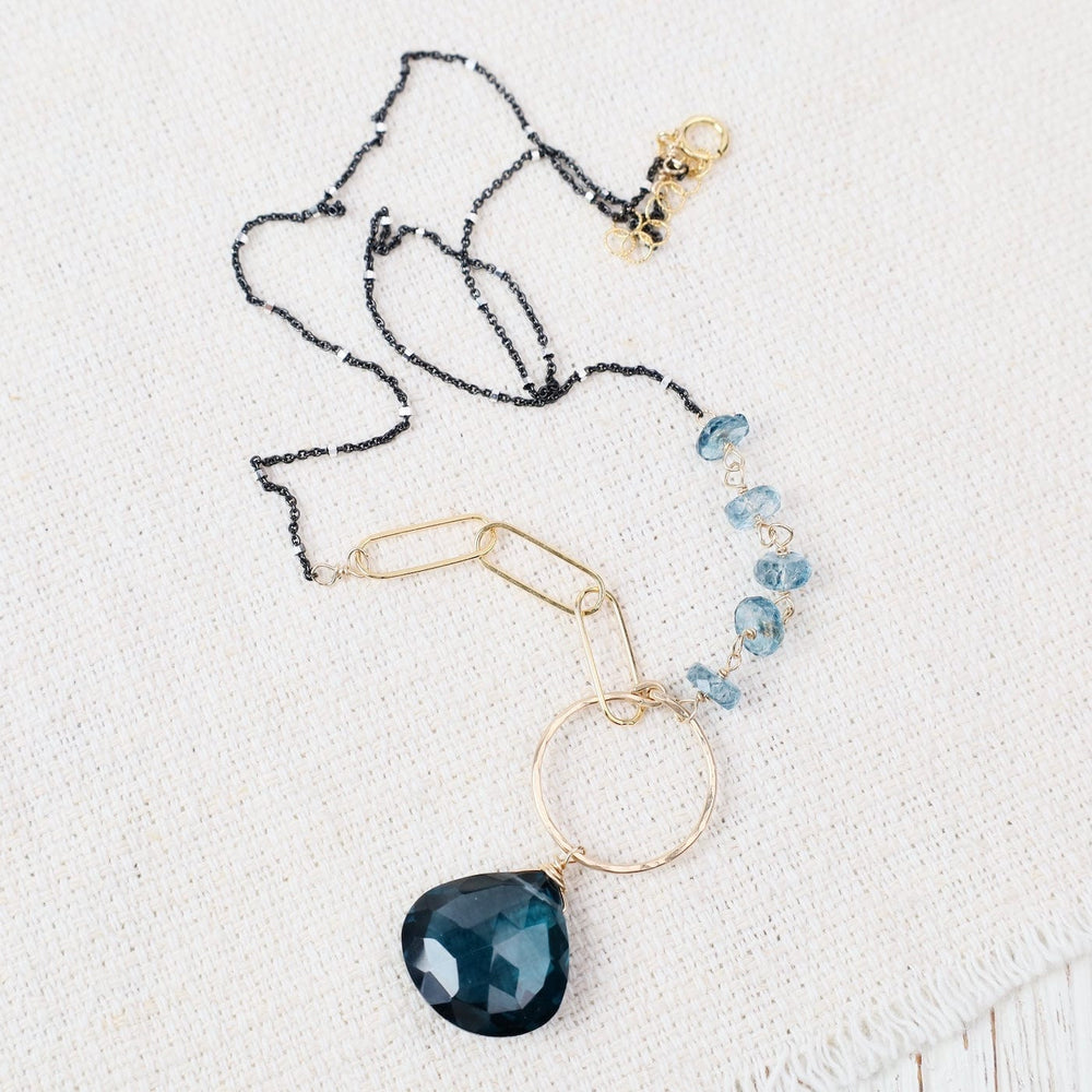 
                  
                    NKL-GF Asymmetrical Paperclip  and Large Drop London Blue
                  
                
