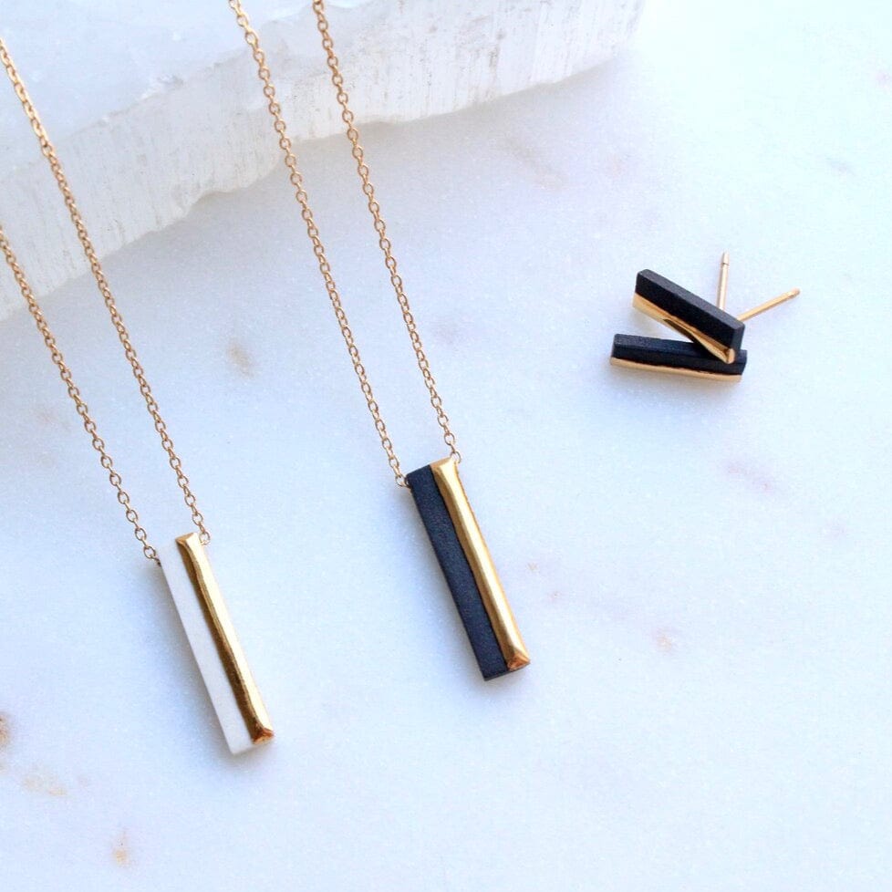 
                  
                    NKL-GF Black Bar 2 Necklace
                  
                