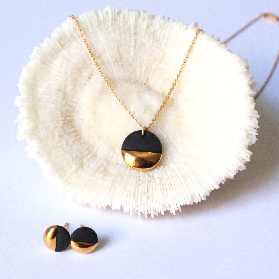 
                      
                        NKL-GF Black Gold Dipped Flat Circle Necklace
                      
                    