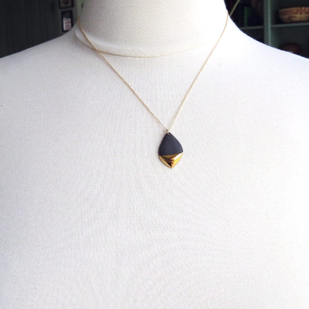 
                      
                        NKL-GF Black Gold-Dipped Marquise Necklace
                      
                    