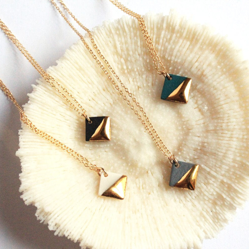 
                      
                        NKL-GF Black Gold Dipped Square Necklace
                      
                    