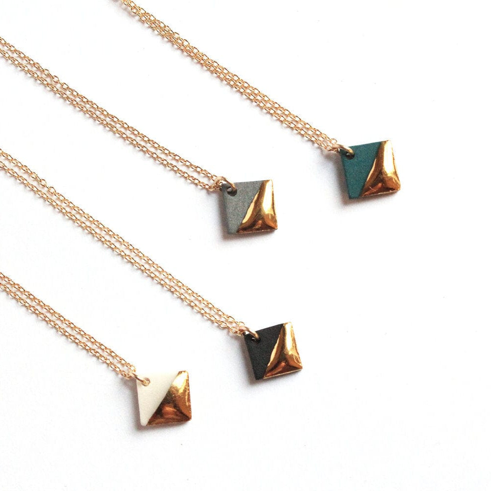 
                      
                        NKL-GF Black Gold Dipped Square Necklace
                      
                    