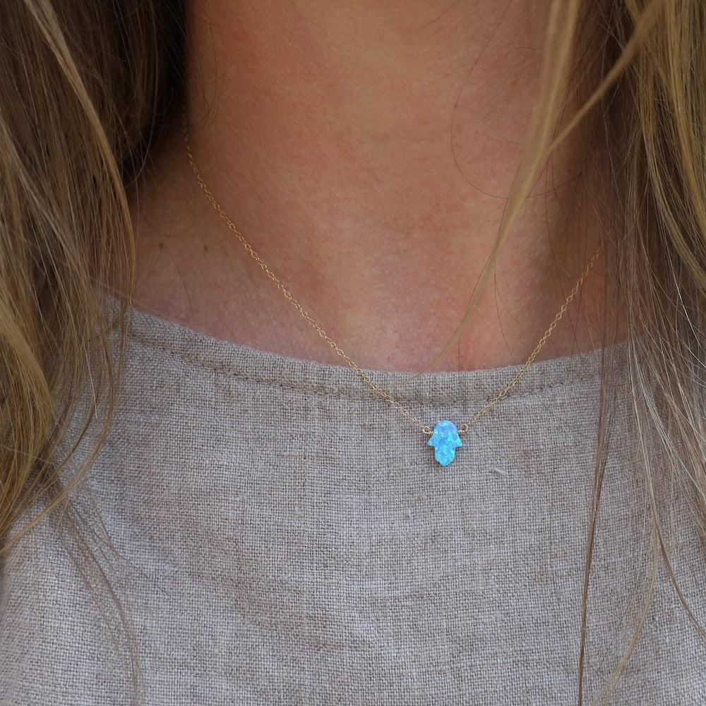 
                      
                        NKL-GF Blue Opal Hamsa Necklace
                      
                    